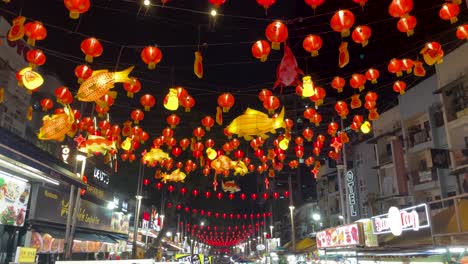 Beautiful-Chinese-Lanterns-light-up-during-the-night-in-Jalan-Alor,-a-famous-street-food-and-night-market-in-Kuala-Lumpur,-Malaysia