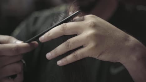 Hairdresser-Combing-And-Cutting-Mens-Hair,-Modern-Style