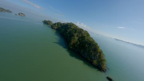 Drone-flying-over-mangroves-along-coast-in-Los-Haitises-National-Park,-Dominican-Republic