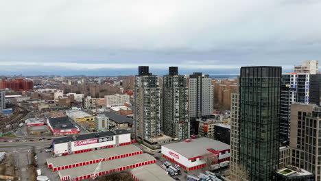 Drone-shot-towards-the-Arches-condos-in-South-Bronx,-cloudy-day-in-New-York,-USA
