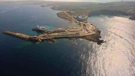 Aerial-Drone-shot-from-from-a-distance-towards-Cirkewwa-Gozo-ferry-Malta