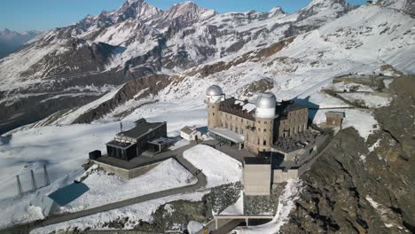 Establishing-Aerial-Shot-of-Gornergrat-Observation-Plaform-in-Zermatt,-Switzerland