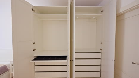 Zoom-out-revealing-an-empty-clothes-closet-in-a-new-apartment