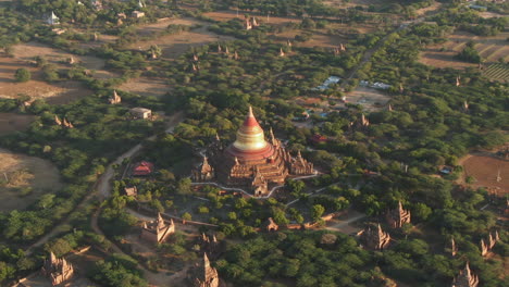 Aerial-top-down-shot-of-famous-Dhammayazika-Pagoda-Buddhist-temple-in-Bagan,-Myanmar-at-sunset