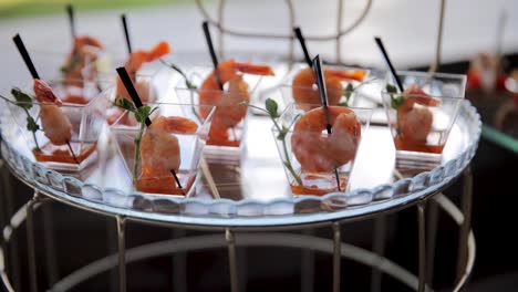 Small-shrimps-in-transparent-glass-on-tray