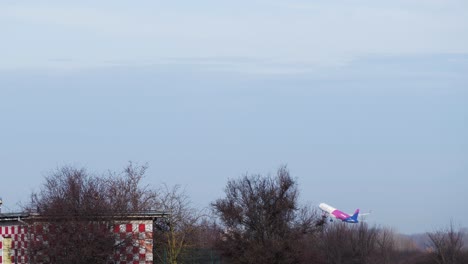 Wizzair-Airbus-Aircraft-Take-Off-From-Small-Airport