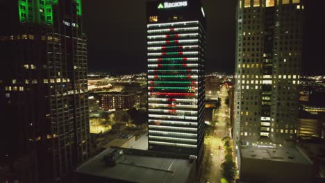 Aerial-of-Region's-Christmas-display-at-night-in-downtown-Birmingham,-Alabama