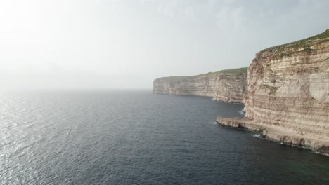 Aerial-View-Of-Sea-Cliff-Side-In-Malta,-Gozo-Island,-Malta