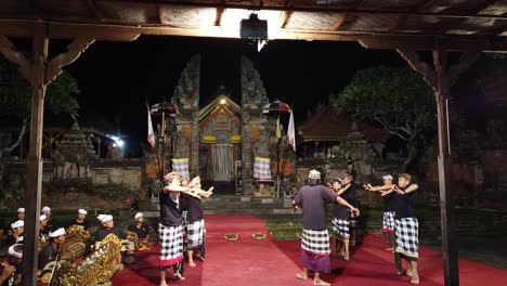 Balinese-Male-Warrior-Dance,-Gamelan-Music,-Temple-at-Night,-Bali-Indonesia-Art-Tradition-in-Singapadu-Village