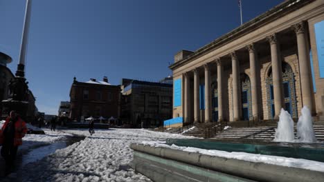 Snowy-Sheffield-City-Hall-on-sunny-day,-wide-angle,-panning