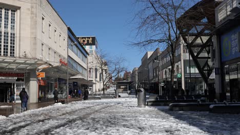 A-snowy-and-sunny-pedestrianised-shopping-street
