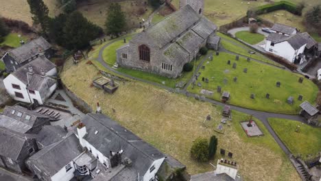 Cinematic-aerial-drone-footage-of-Hawkshead-Village-and-St-Michael-and-All-Angels-Church