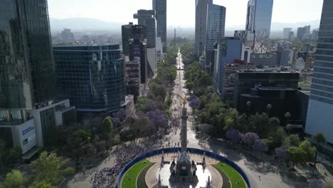 Drone-showing-the-international-march-for-women's-day-in-the-streets-of-the-Mexico-City,-8-march-2023