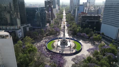 Drone-showing-the-international-march-for-women's-day-in-the-streets-of-the-Mexico-City,-8-march-2023