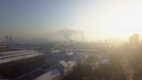 High-key-morning-aerial-over-winter-city-with-air-pollution-smog