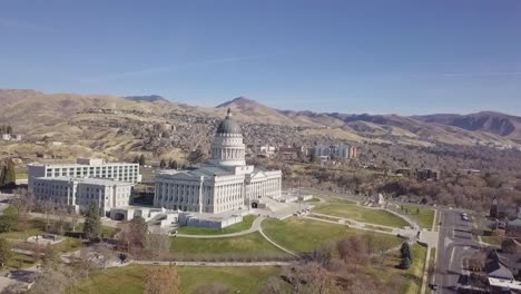 Aerial-wrap-around-of-Utah-State-Capital,-looking-out-on-Salt-Lake-City,-Utah