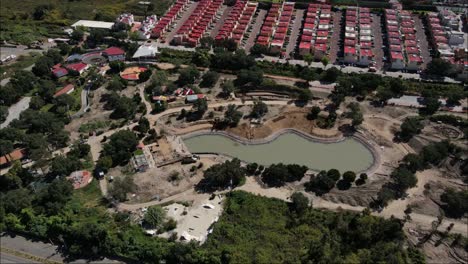 Aerial-drone-view-of-unfinished-city-park-construction-in-Mexico,-4K-video