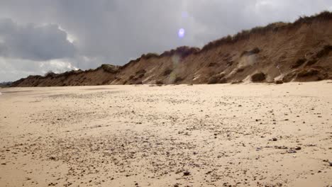 Coastal-erosion-of-Sandunes-on-Hemsby-Beach,-Wide-shot