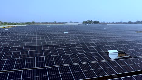 Solar-Photovoltaic-of-aerial-top-view,-solar-plant-rows-array-of-ground-mount-system-Installation