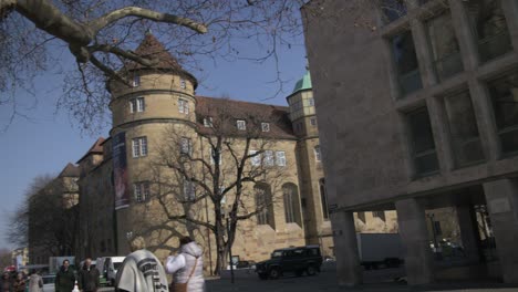 Elderly-Women-Walking-In-Downtown-Near-Castle---Schlossplatz-In-Downtown-Stuttgart-in-4K,-Classic-Germany-Architecture,-Famous,-Red-Komodo-Cooke-Mini-S4i-Lens-Premium-Quality-|-News