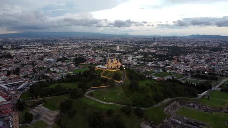 aerial-view-of-the-pyramid-of-cholula-with-a-storm-in-the-background
