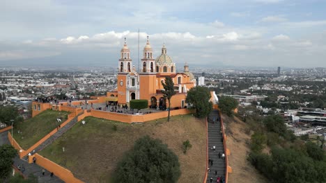aerial-view-of-cholula-pyramid-and-church-at-noon