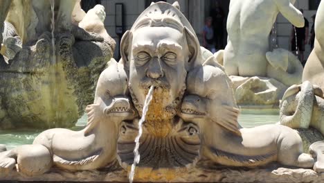 Dragons-and-masks-of-the-Moor-Fountain-,-Piazza-Navona-in-Rome,-Italy