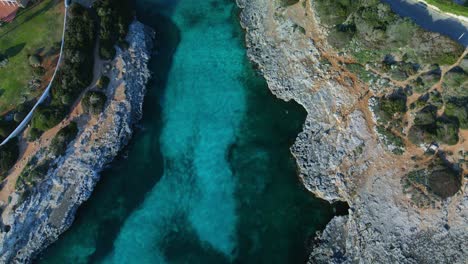 Top-down-view-of-Sa-Caleta-in-Menorca-Spain