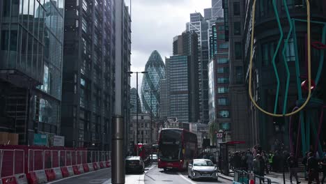 London,-England--September-29-2021:-Buses-and-cyclists-traffic-on-Liverpool-Street,-in-the-heart-of-the-financial-district-in-the-City-of-London,-near-Liverpool-street-train-station