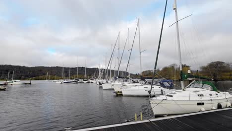 Boats,-sailing-ships,-moored-on-the-harbor-of-Bowness-on-Windermere