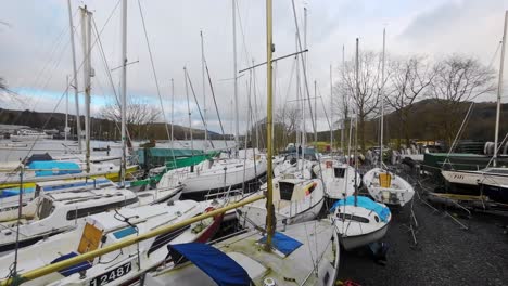 Boats,-sailing-ships,-moored-on-the-harbor-of-Bowness-on-Windermere