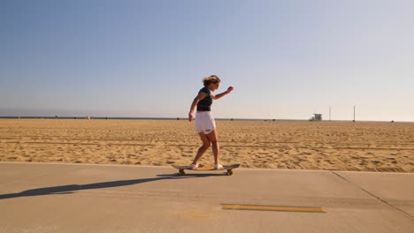 Woman-Riding-Longboard-Then-Catch-On-A-Sunny-Summer-Day