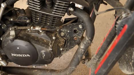 View-Of-Dirt-And-Mud-On-Engine-Of-Honda-CB150F