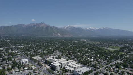 Urban-Cityscape-of-Millcreek,-Utah-with-Wasatch-Mountain-Background,-Aerial