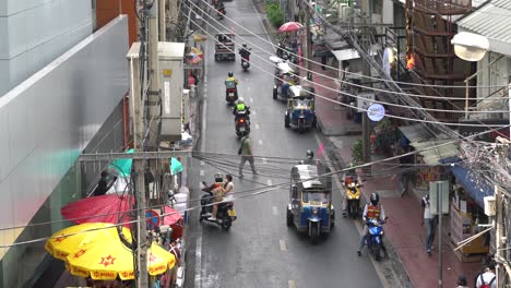 High-angle-view-of-motorbikes-at-Soi-Sala-Daeng-1,-Si-Lom,-Bangkok