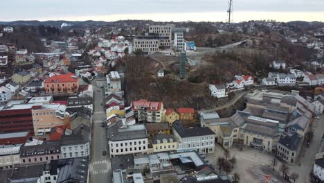 Floyheia-with-glass-elevator-and-street-Vestregate-in-Arendal-Norway---Ascending-aerial