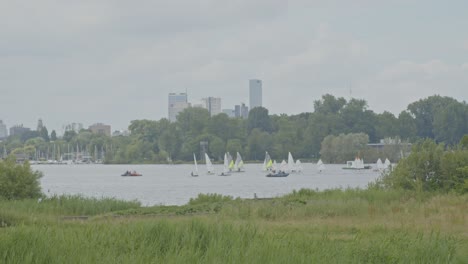 Sailboats-sailing-in-front-of-Rotterdam-skyline-in-the-Netherlands
