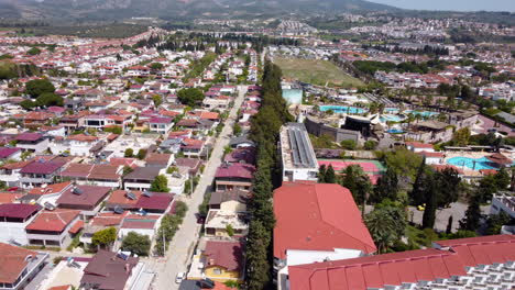 Aerial-View-Of-Davutlar-Town-In-Kusadasi,-Turkey-At-Daytime---drone-shot