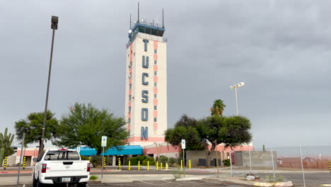 Tucson-International-Airport,-Air-control-tower.-Tilt-up-shot