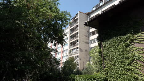 The-rear-of-a-hotel-lies-damaged-with-its-centre-destroyed,-floors-collapsed-and-rooms-exposed-over-the-entrance-following-a-Russian-missile-strike-during-the-Russian-war-in-Ukraine