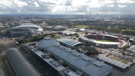 Vista-Aérea-Del-Parque-Olímpico-De-Sydney-Con-El-Estadio-Accor,-El-Qudos-Bank-Arena-Y-El-Recinto-Ferial-Del-Estadio-De-Los-Gigantes-De-Sydney