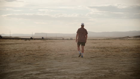 Man-walks-alone-in-Moab-Utah