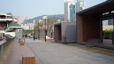 Pan-Left-View-Across-Newly-Renovated-Promenade-At-Wan-Chai,-Hong-Kong