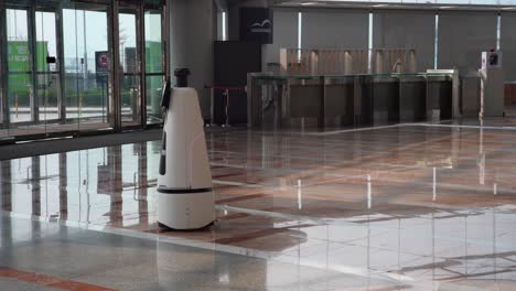 Automatisierter-Roboterführer,-Der-Sich-Im-Kongress--Und-Ausstellungszentrum-Von-Hongkong-Bewegt
