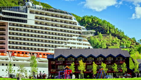 Massive-cruise-ship-moored-in-port-of-Flam,-Norway,-fusion-time-lapse