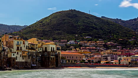 Looking-across-the-ocean-and-beach-at-Termini-Imerese,-Sicily-Italy---time-lapse