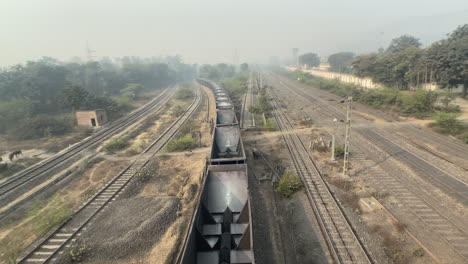 High-angle-shot-of-an-empty-coal-train-passing