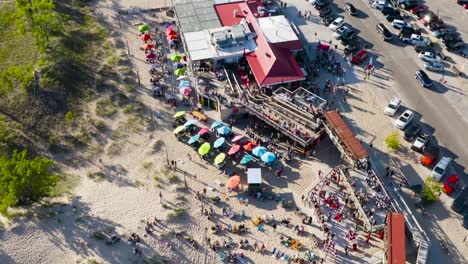 Drone-footage-of-beach-restaurant-during-the-day