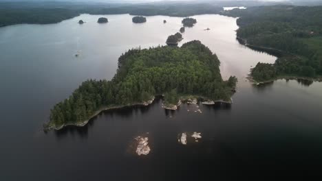 Aerial-of-small-islands-on-lake-in-Sweden