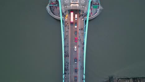 Dolly-in-Top-down-shot-of-the-Tower-Bridge-in-London,-during-the-evening